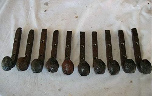 10 repurposed railroad spike coat hooks coat rack shown in use